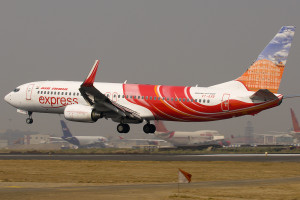 Air India Express Boeing 737-800 VT-AXN lands at Mumbai CSI airport.