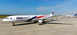 Malaysia Airlines Airbus A330-300 9M-MTE in special oneworld livery. See another photo here. This aircraft performed the first flight of the airline as a member of oneworld in the early hours of Feb 1 from Kuala Lumpur to Melbourne.