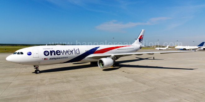 Malaysia Airlines Airbus A330-300 9M-MTE in special oneworld livery. See another photo here. This aircraft performed the first flight of the airline as a member of oneworld in the early hours of Feb 1 from Kuala Lumpur to Melbourne.