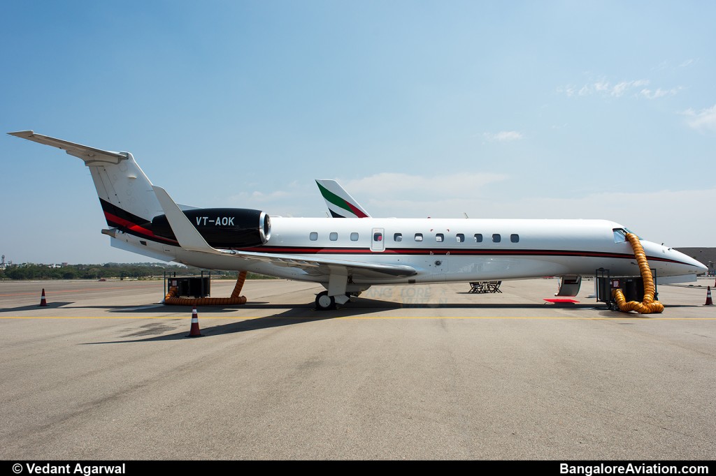 VT-AOK Embraer Legacy 600 at Hyderabad Begumpet Airport. An external air conditioning unit is pumping in cold air through the cockpit window.