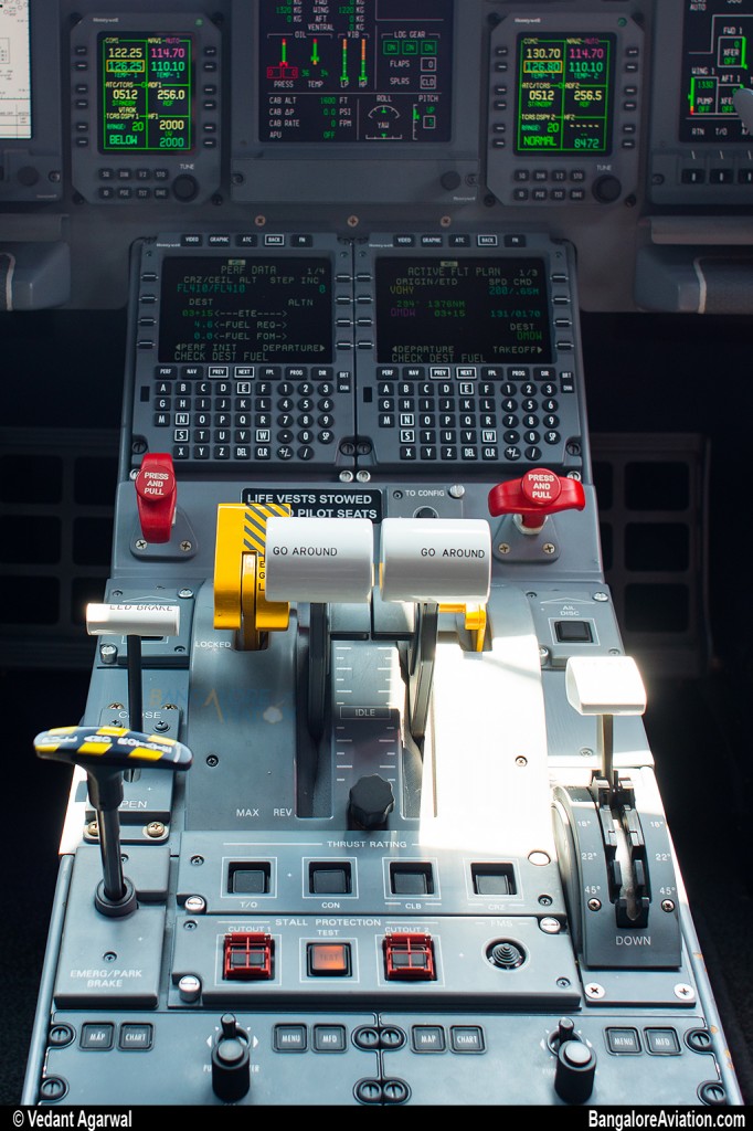 Close up of the thrust, flap and speed brake controls.