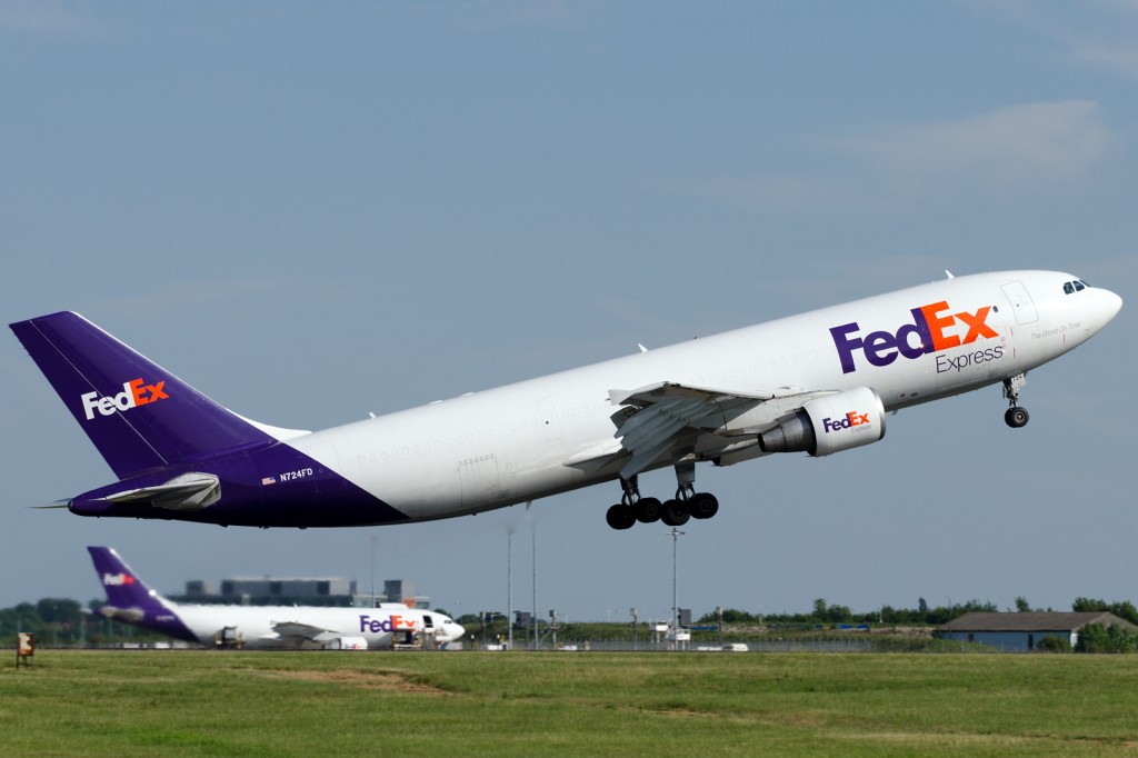 FedEx-Express Airbus A300B4-622R(F) N724FD departs from London Stansted airport. Its sister N727FD in the background.