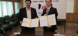 Mr Pankaj Srivastava, commercial director of Air India and Mr. Li Dianchun, commercial director of Hong Kong Airlines sign code-share agreement in Delhi. Photo courtesy the airlines.