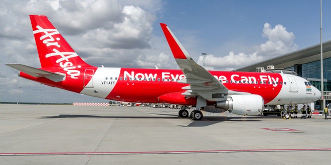 First flight of AirAsia India. Plane at the gate.