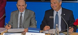 An unusually cheerful Akbar Al Baker, CEO, Qatar Airways with Ray Connor, President, Boeing Commercial Aircraft at 100 777-9X order signing. Farnborough air show 2014.