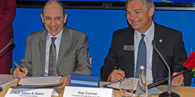 An unusually cheerful Akbar Al Baker, CEO, Qatar Airways with Ray Connor, President, Boeing Commercial Aircraft at 100 777-9X order signing. Farnborough air show 2014.