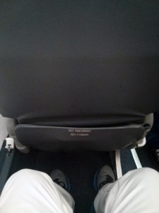 Leg room in the first class cabin of the Embraer 175.