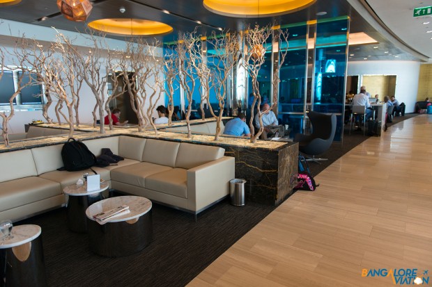 Various seating arrangements for passengers in the lounge. 