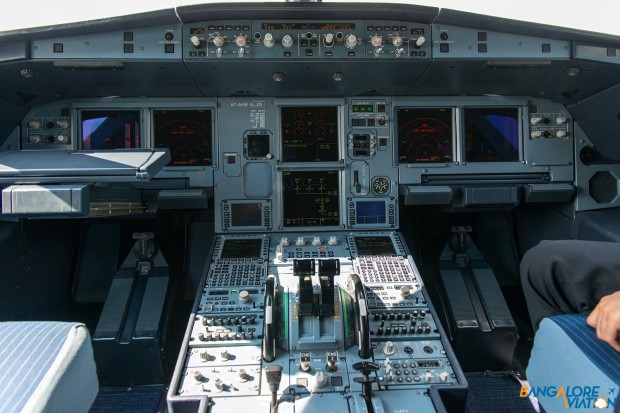 Cockpit overview of Qatar Airways A320.