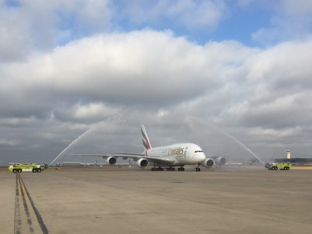 Emirates A380, A6-EET is given a water cannon salute on its first flight to Dallas-Fort Worth airport.