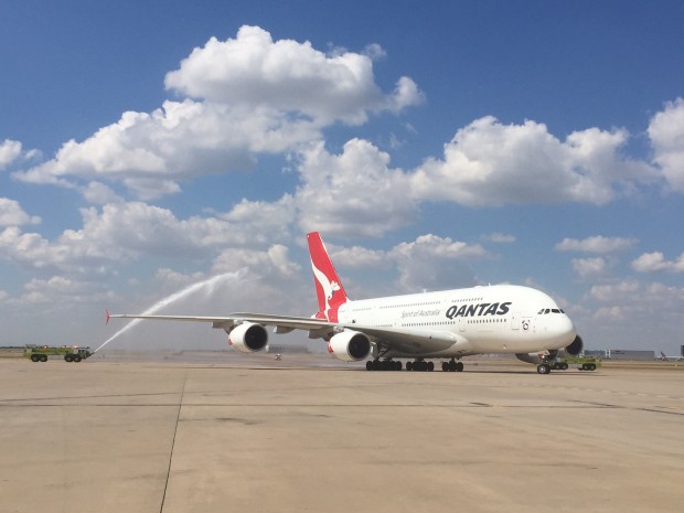 Qantas A380 VH-OQL Phyllis Arnott receives a water cannon salute on its first flight to Dallas-Fort Worth airport. Photo courtesy the airport.