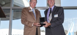 787 Vice President and General Manager Larry Loftis (right) hands the ceremonial keys over to The Museum of Flight President and CEO Doug King