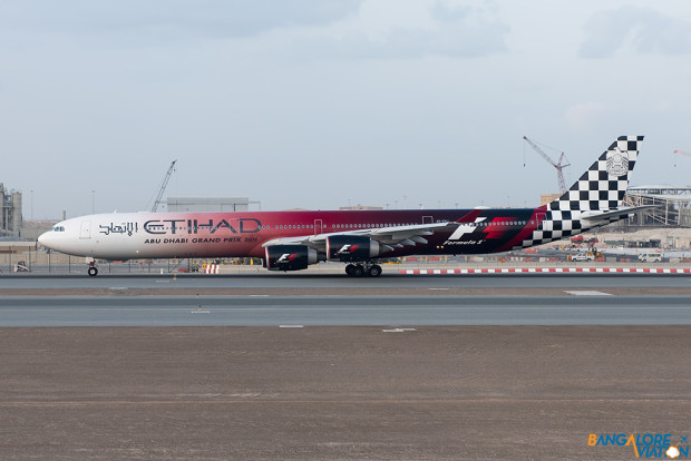 While landing, I saw A6-EHJ - The Formula 1 livery A340-600 taxing on the parallel taxiway.