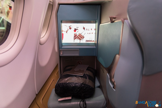 The legroom and screen in Etihad Business class.