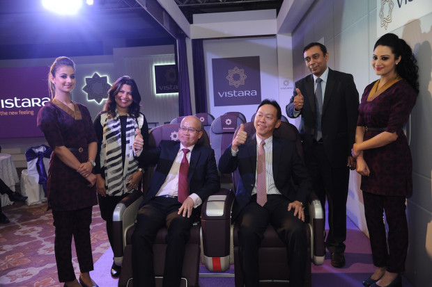 Vistara crew members flank Ms Rashmi Soni Head Corporate Communication Mr Vistara CEO Phee Teik Yeoh and CCO Giam Ming Toh introducing the new cabins