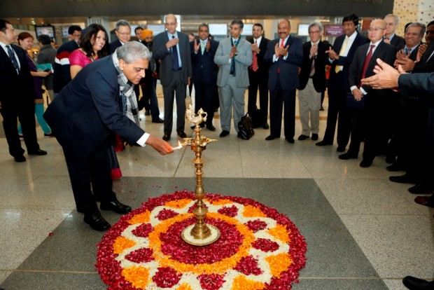 Vistara Chairman Prasad Menon lights the ceremonial lamp.