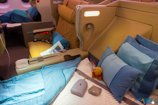 Singapore Airlines A380 Business Class. Comparing the seats upright and turned down full flat bed.