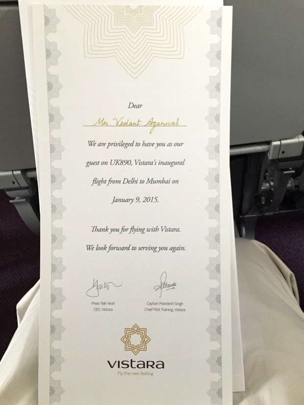 A certificate was given to all passengers who flew on the inaugural flight of Vistara Tata-SIA airline. Also observe the additional three inches of leg-space (33 inch seat pitch) provided in premium economy class.