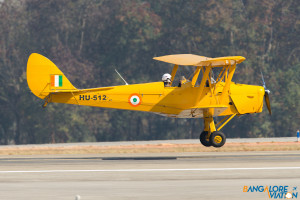 The Tiger Moth making a slow and graceful landing.