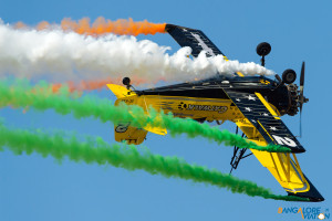 The Ag-Cat trailing the Tricolour behind it in brilliant display.