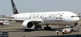Air India Boeing 777-300ER VT-ALJ Bihar in special Star Alliance livery being wheeled out of the hangar.