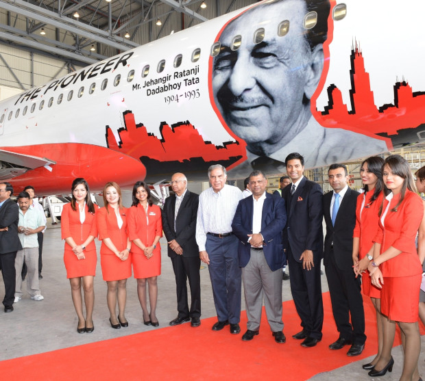 S Ramadorai, Ratan Tata, Tony Fernandes and Mitu Chandilya with AirAsia staff
