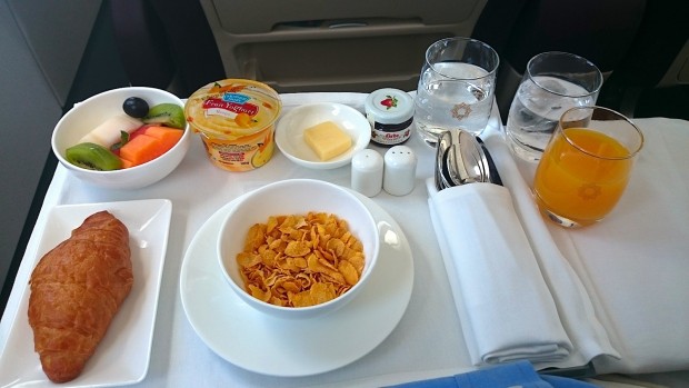 Vistara business class breakfast. Cereal and fruit.