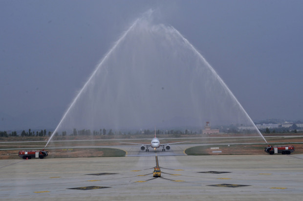 AirAsia India Airbus A320 VT-JRT, crossing the water cannon salute. AirAsia Image.