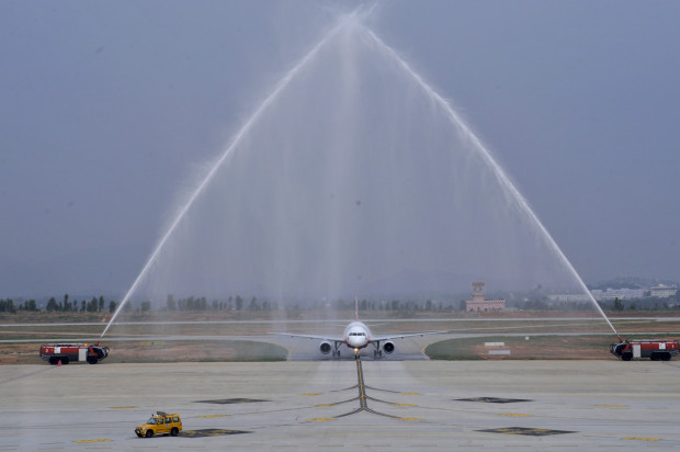 AirAsia India Airbus A320 VT-JRT, crossing the water cannon salute. AirAsia Image.