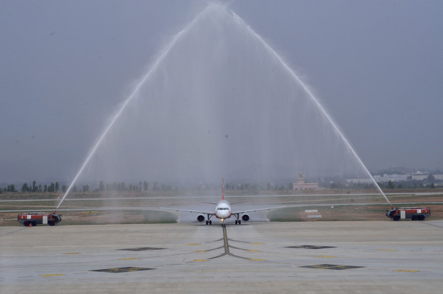 AirAsia India Airbus A320 VT-JRT, crossing the water cannon salute. AirAsia Image.