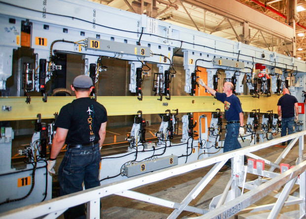 The first spar being assembled at Boeing's Renton Plant. 