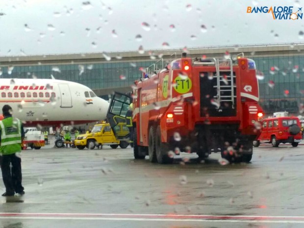 CSI airport ARFF and emergency services scramble in the rain after Air India Airbus A320 VT-EPJ hit and damaged by tractor