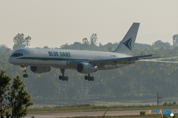 BlueDart Boeing 757-200 VT-BDQ. Observe the vortices coming of the edge of the flaps as the plane approaches the threshold of Runway 27 at Bangalore.