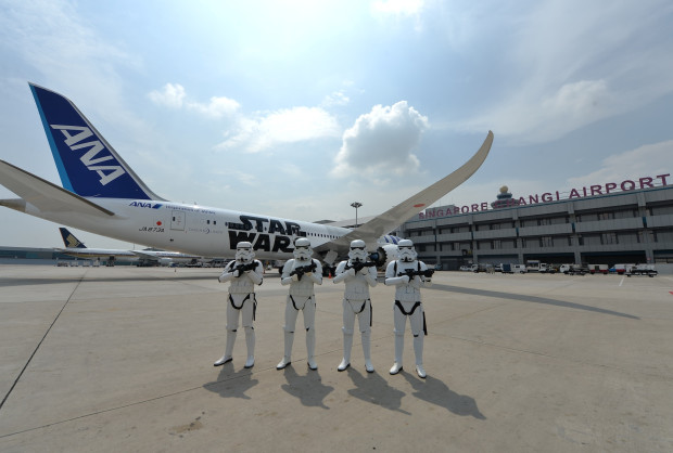 Imperial Stormtroopers with R2-D2 All Nippon Airlines Jet. Photo courtesy Changi Airport