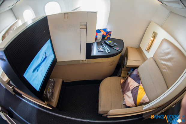 Business class cabin on Etihad's Boeing 787-9. Privacy screen raised