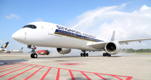 First A350 XWB of Singapore Airlines receives the traditional water cannon salute at Singapore Changi airport.