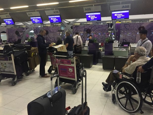 The business class island with only one active desk.