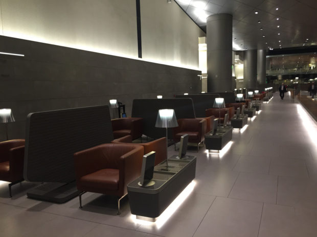 Seating at the Al Mourjan lounge. Observe the partitions between seats that provide privacy to each passenger.