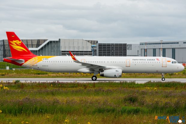 Capital Airlines Airbus A321 D-AVZY. Back tracking after landing.