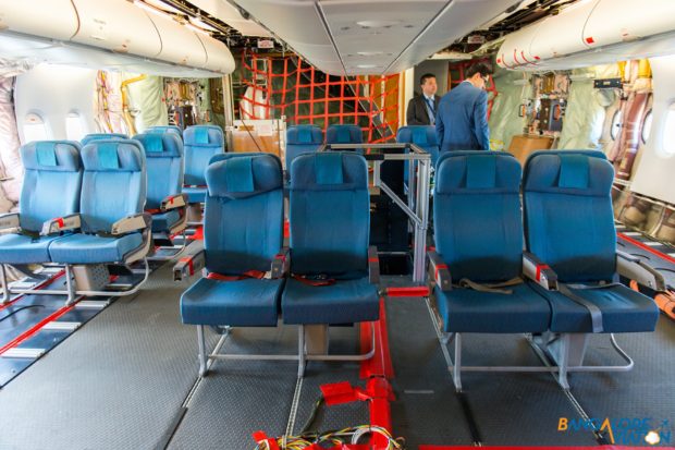 Small seating area at the back of the lower deck for passengers.