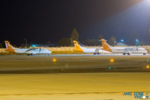 Grounded carrier Air Pegasus's fleet of ATR-72's parked at one corner of the apron.