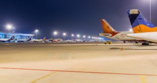 View of part of the ramp at Bangalore Airport at night.