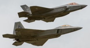 The US Air Force F-22A Raptor and F-35A Lightning II fly in formation.