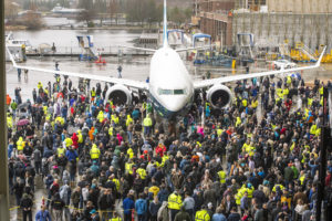 The 737 MAX 9 along with plant employees. Boeing Image.