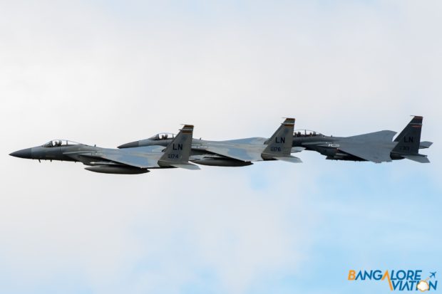 Two McDonnell Douglas F-15C Eagles with a McDonnell Douglas F-15E Strike Eagle.