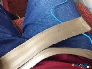 Dirty and worn looking seat belts.