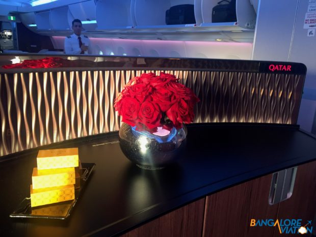 The center table - during the flight there is also a bottle of champagne and some flutes placed here.