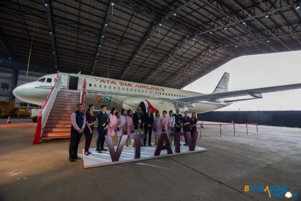Vistara executives and crew pose before the Retro Livery Tata SIA Airlines Vistara Airbus A320neo. Image copyright Devesh Agarwal. Used with permission.