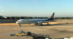 A Jet Airways Boeing 777-300ER pulling into it's gate at London Heathrow.