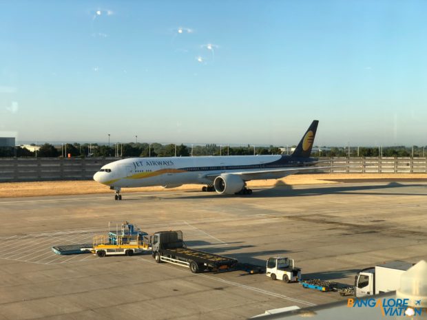 A Jet Airways Boeing 777-300ER pulling into it's gate at London Heathrow.